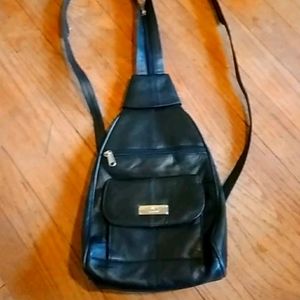 Black leather back pack 12" X 8" X 4"